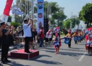Pj Bupati Jombang Berangkatkan Lomba Kirab Drum Band